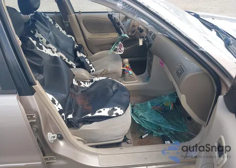 2002 Toyota Corolla Le from USA, damaged, VIN 2T1BR12E72C537034